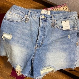 Brand new w/tags Free People Distressed denim shorts , Size 30.